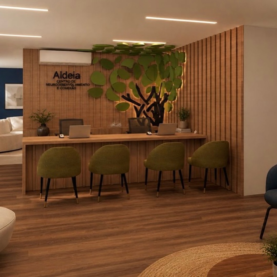 Recepção da clínica Aldeia com painel de árvore